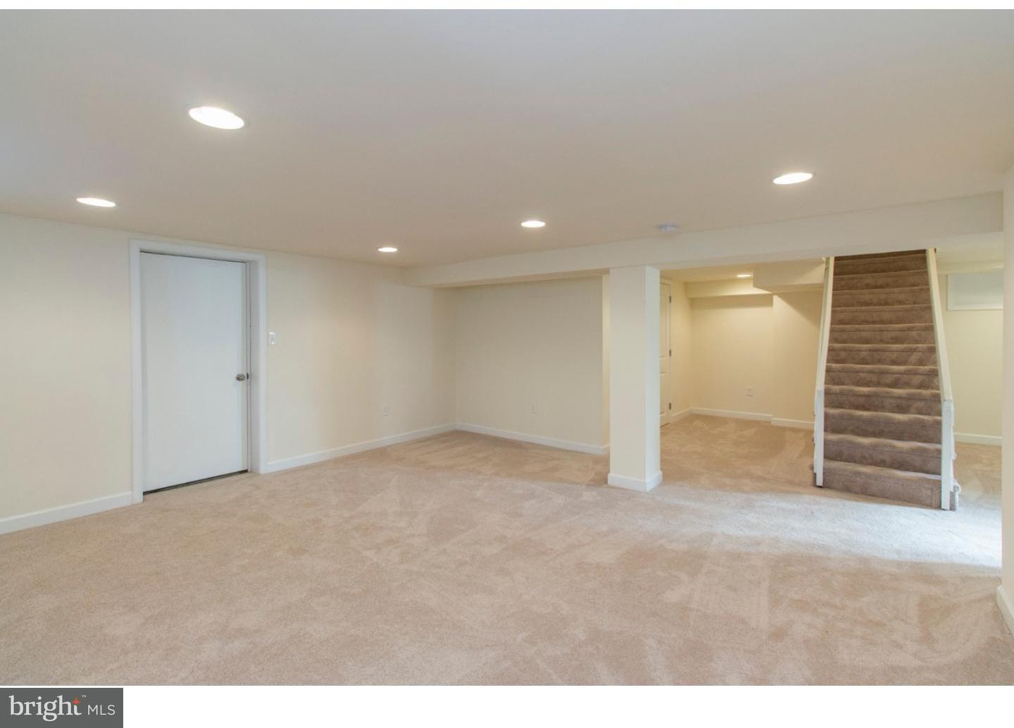 343 Kent Road Springfield, PA 19064 - Photo 22 of 25 a view of an empty room with a hallway