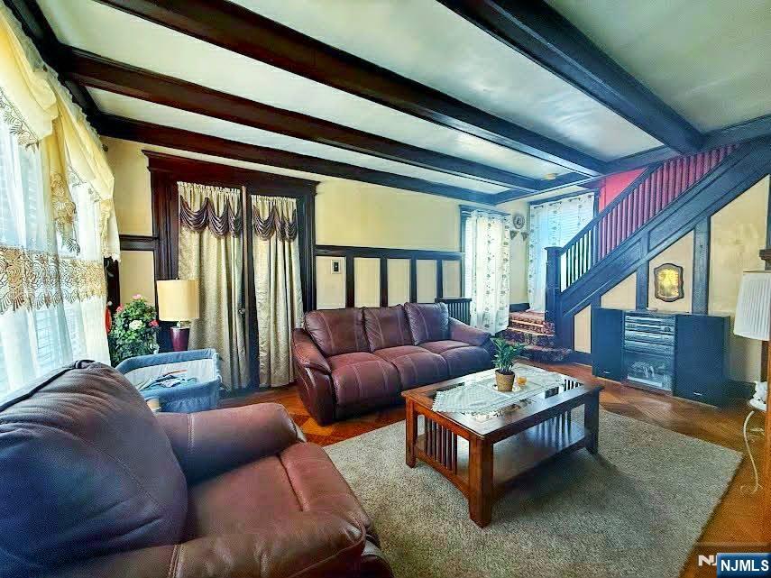 102 State Street Bloomfield, NJ 07003 - Photo 2 of 11 a living room with furniture and a large window