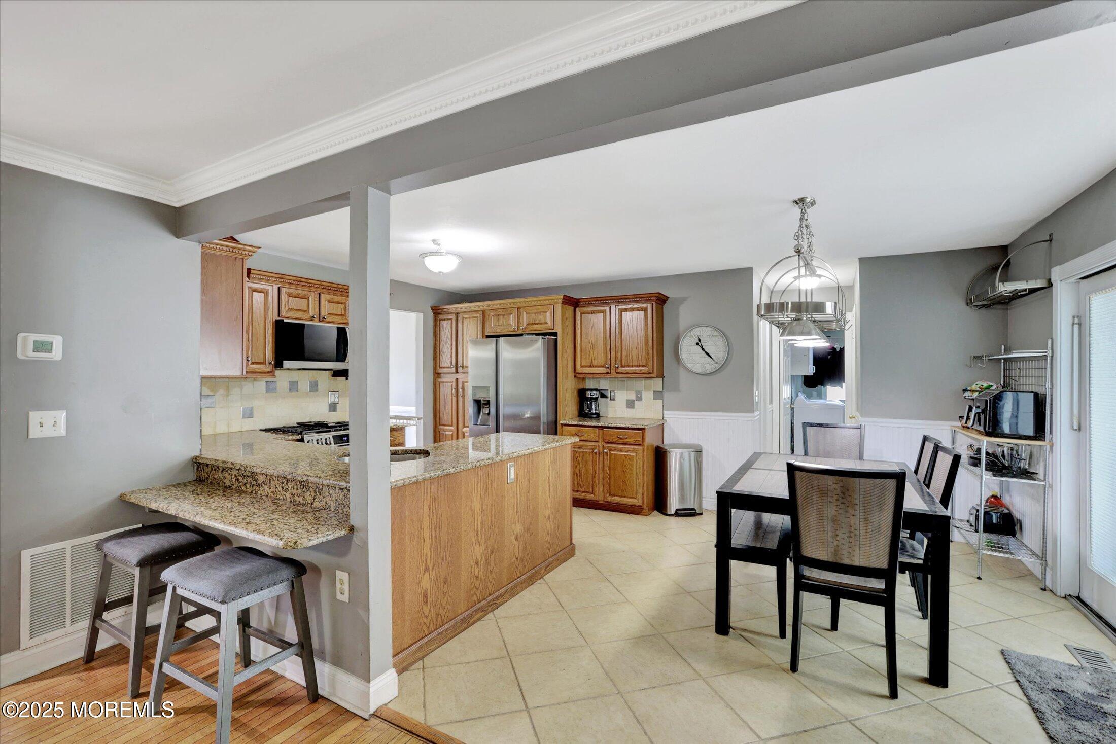 8 Shadow Ridge Court Howell, NJ 07731 - Photo 11 of 39 a view of a dining room with furniture