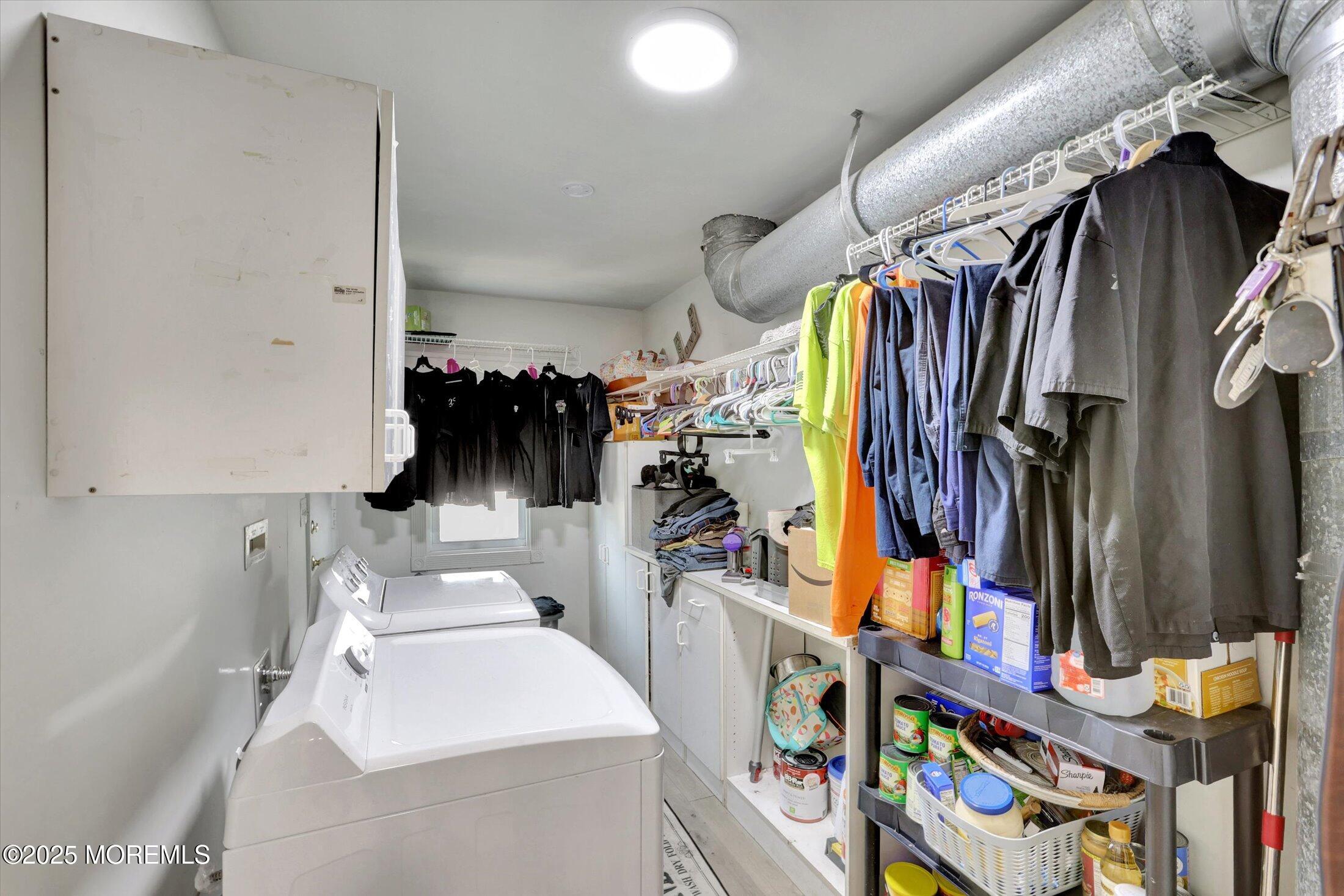 8 Shadow Ridge Court Howell, NJ 07731 - Photo 15 of 39 a view of walk in closet with clothes and shoes
