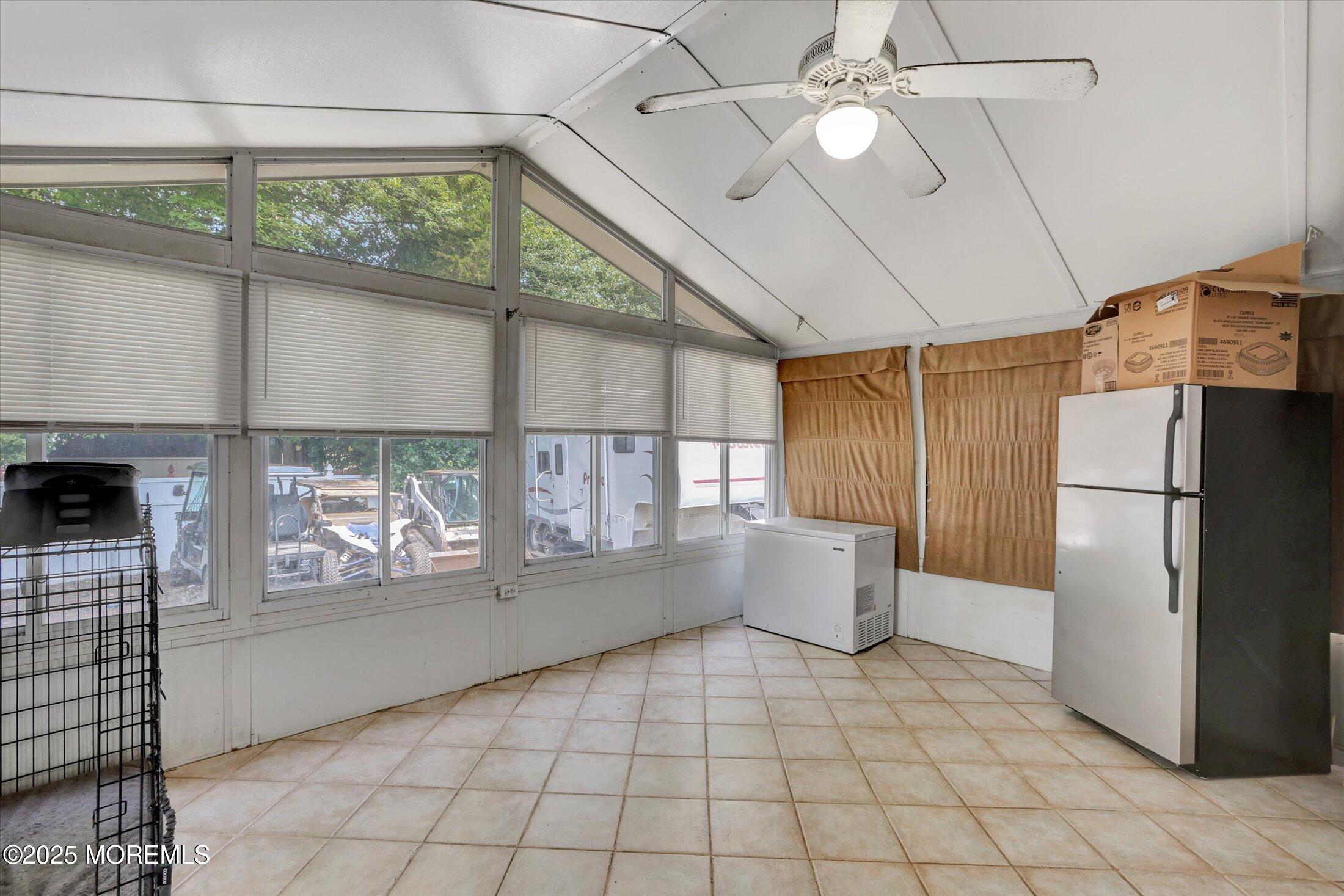 8 Shadow Ridge Court Howell, NJ 07731 - Photo 17 of 39 a kitchen with a refrigerator and a stove top oven
