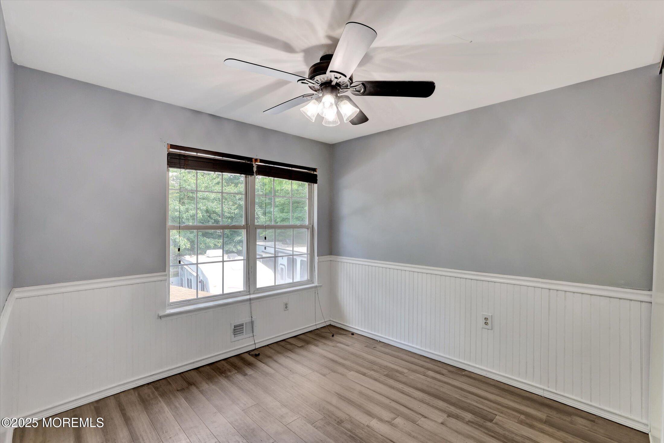 8 Shadow Ridge Court Howell, NJ 07731 - Photo 20 of 39 a view of an empty room with a window