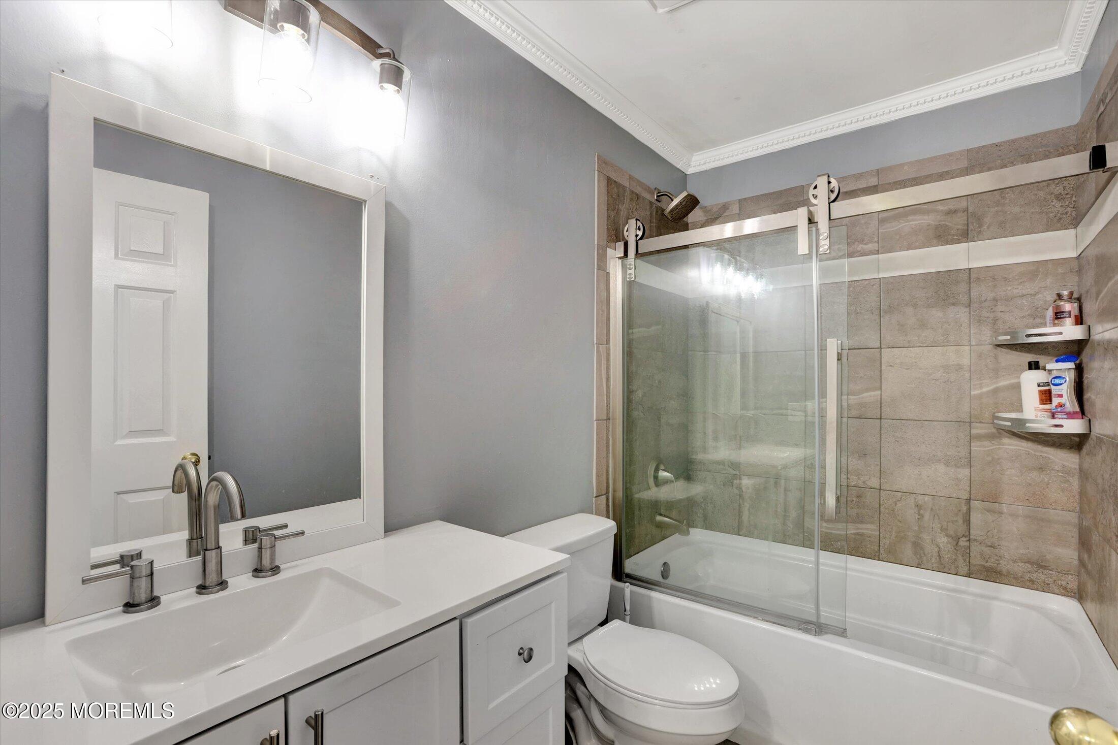 8 Shadow Ridge Court Howell, NJ 07731 - Photo 21 of 39 a bathroom with a sink mirror toilet and bathtub