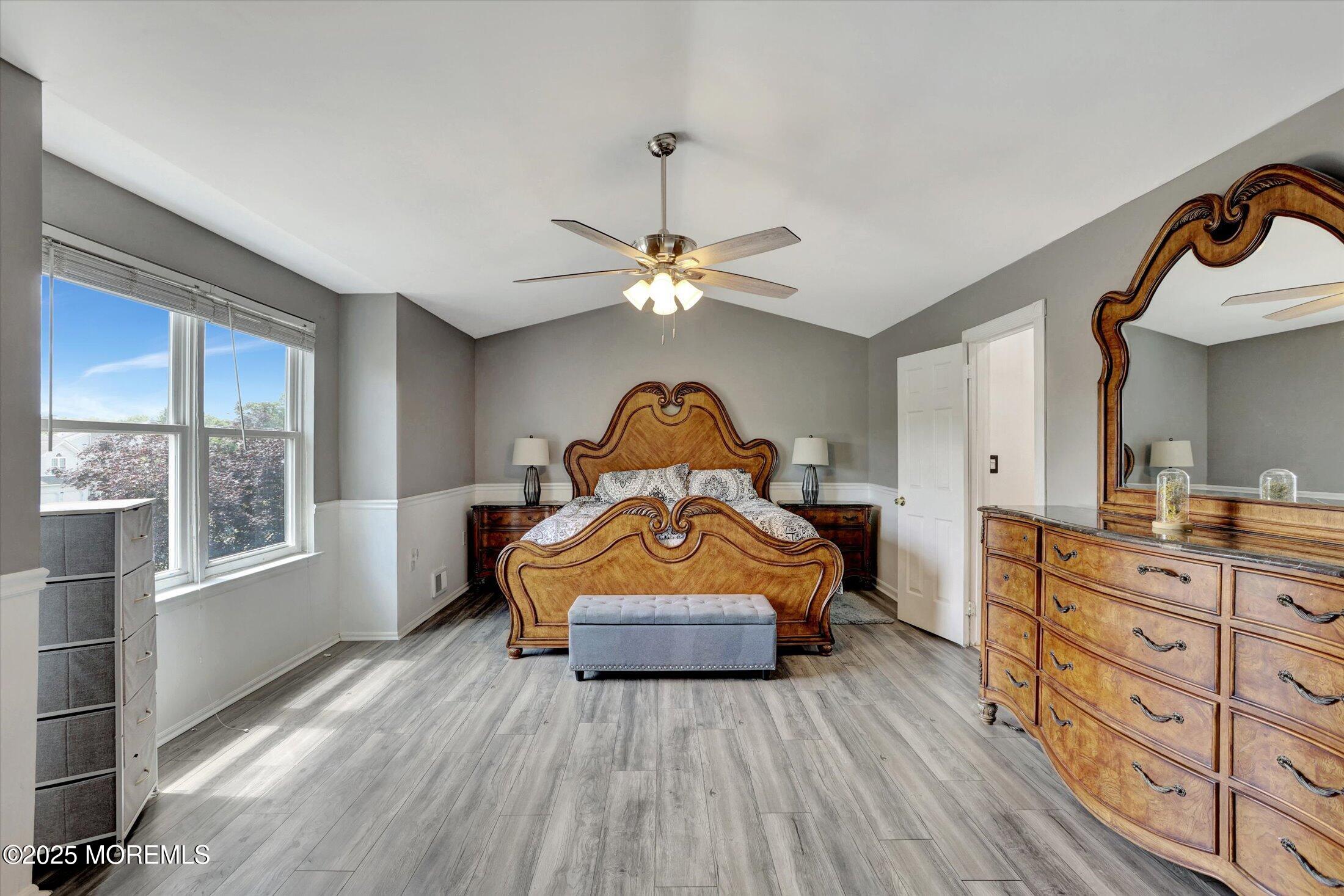 8 Shadow Ridge Court Howell, NJ 07731 - Photo 23 of 39 a living room with furniture and a large window