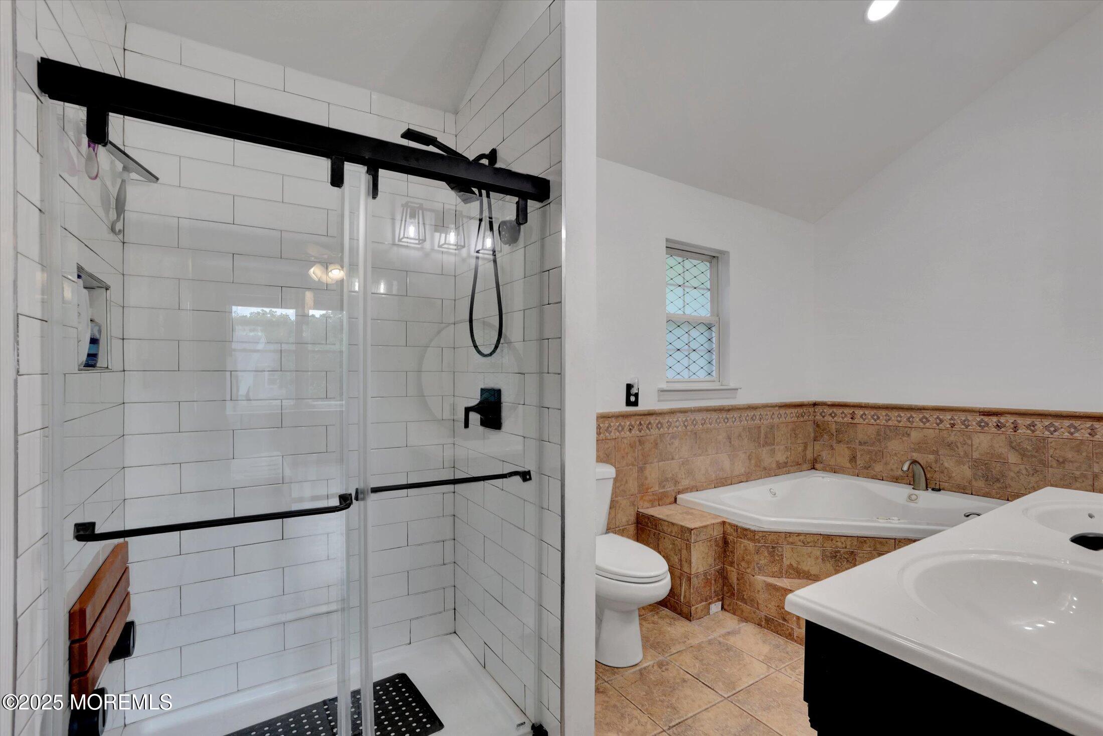 8 Shadow Ridge Court Howell, NJ 07731 - Photo 25 of 39 a bathroom with a shower toilet and sink
