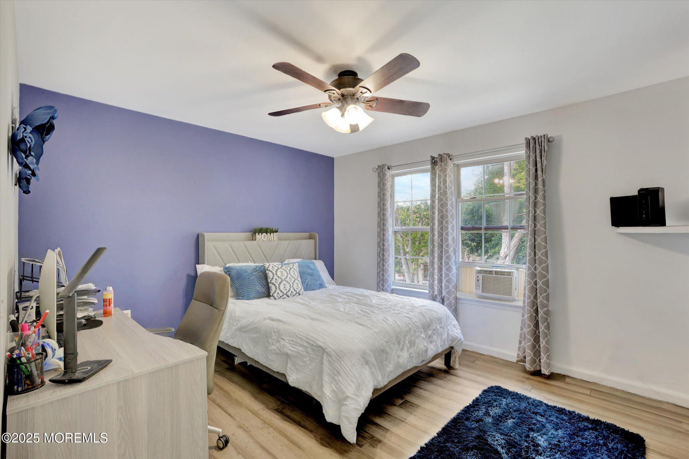 8 Shadow Ridge Court Howell, NJ 07731 - Photo 27 of 39 a bedroom with a bed and a window