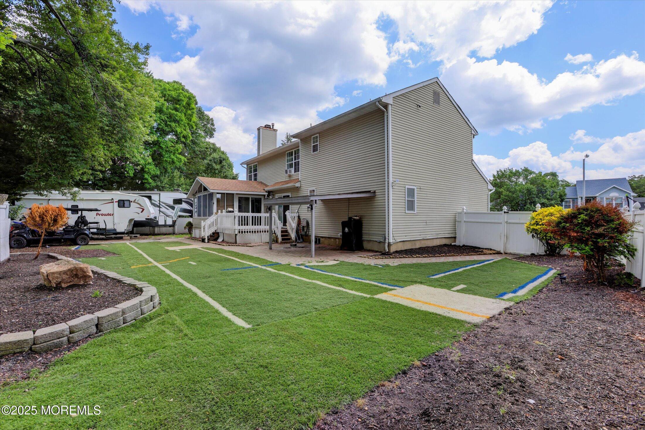 8 Shadow Ridge Court Howell, NJ 07731 - Photo 36 of 39 a view of a chair and table in the garden