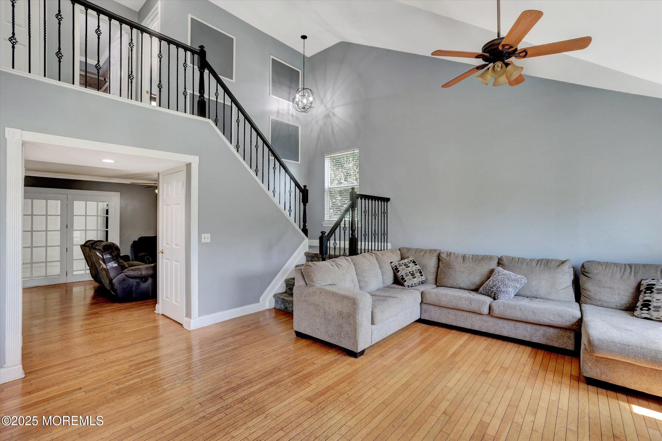 8 Shadow Ridge Court Howell, NJ 07731 - Photo 4 of 39 a living room with furniture and a wooden floor
