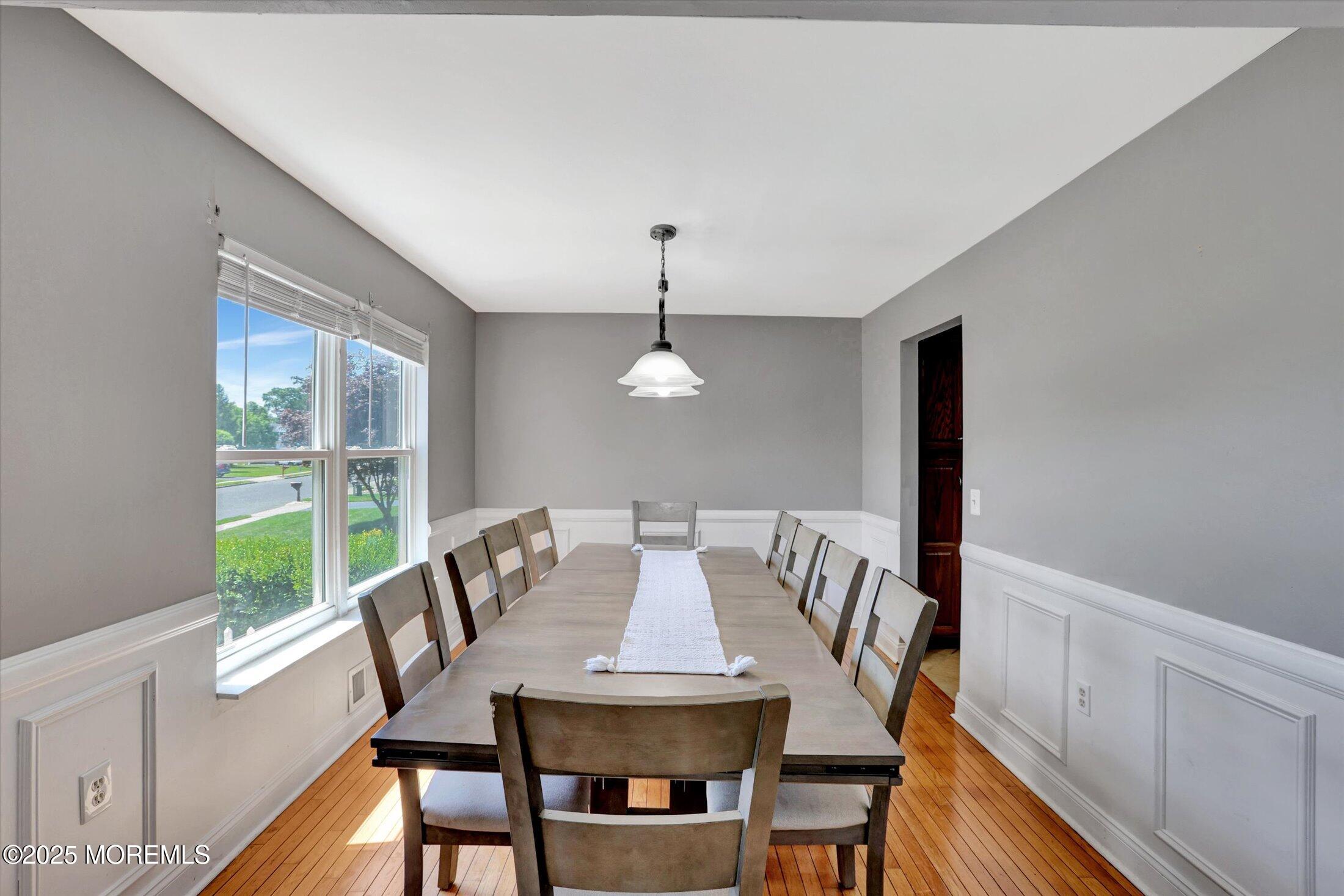 8 Shadow Ridge Court Howell, NJ 07731 - Photo 8 of 39 a view of a dining room with furniture window and wooden floor