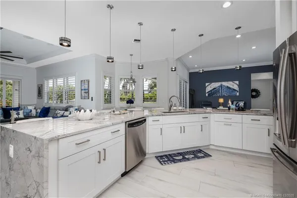 a bathroom with a double vanity sink mirror and double