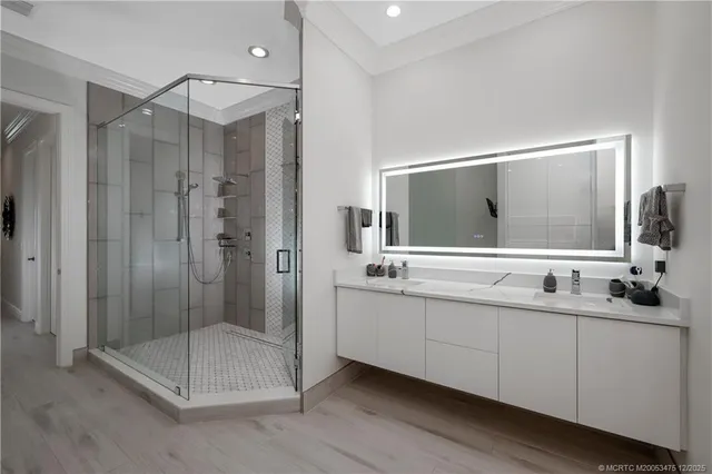 a bed room with a bed and a chair