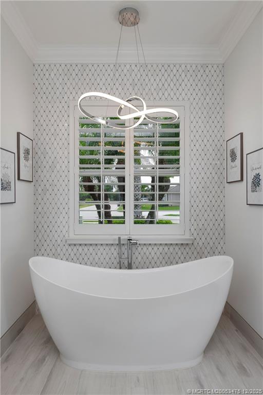 467 Southwest Lost River Road Stuart, FL 34997 - Photo 28 of 65 a white bath tub sitting in a bathroom