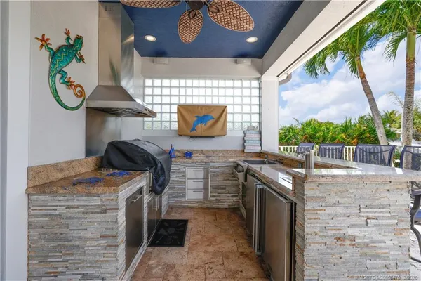 an aerial view of a house with outdoor space