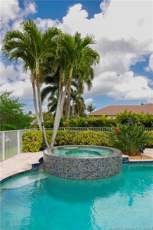 467 Southwest Lost River Road Stuart, FL 34997 - Photo 48 of 65 a view of a backyard with plants