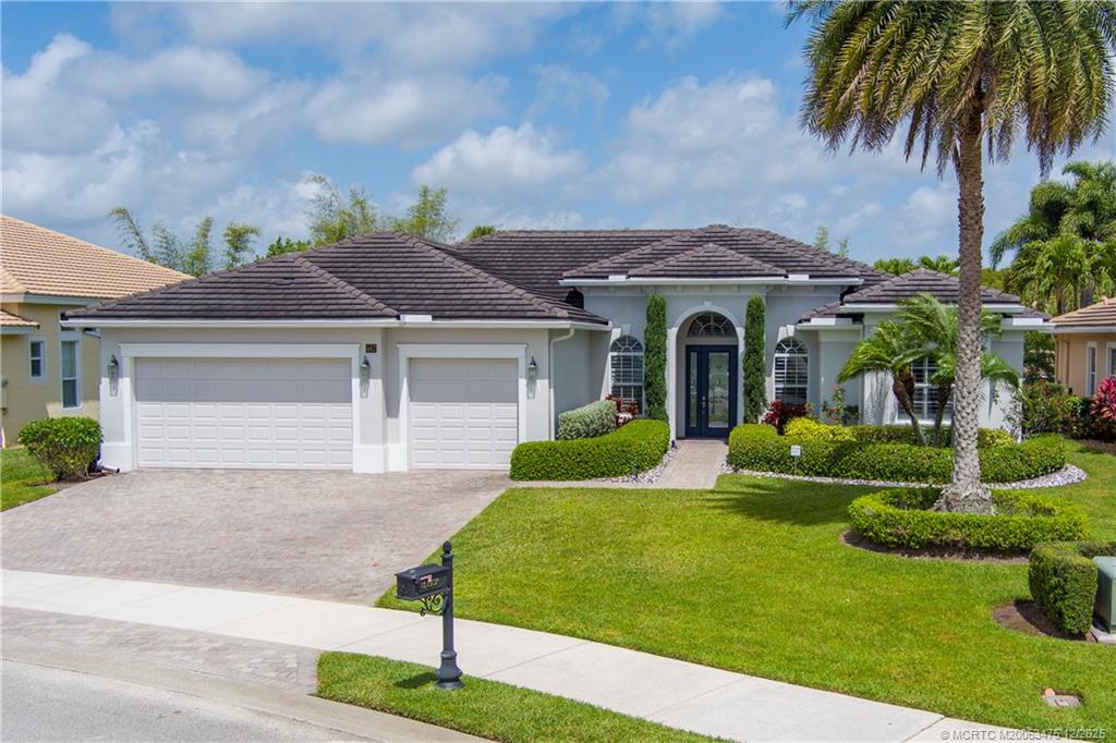 467 Southwest Lost River Road Stuart, FL 34997 - Photo 65 of 65 a front view of house with yard and green space