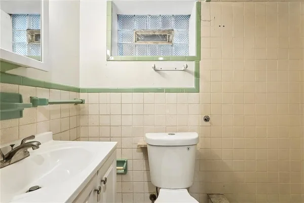 a bathroom with a sink and a toilet