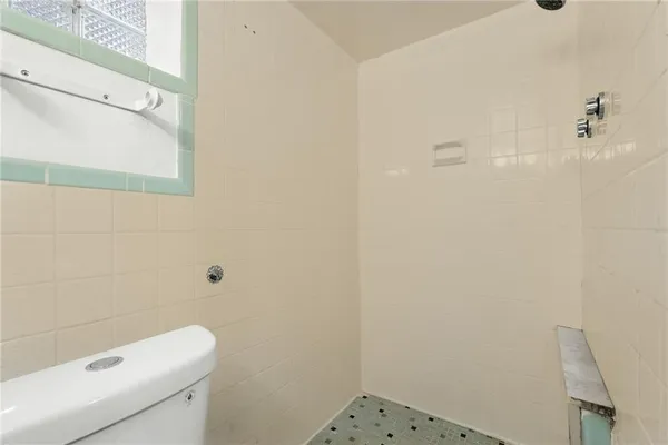 a bathroom with a sink and a shower
