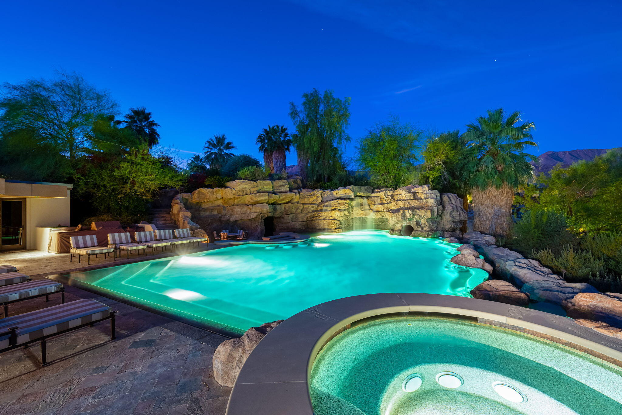 100 Lantana View Palm Desert, CA 92260 - Photo 119 of 121 a view of a swimming pool with a yard and plants