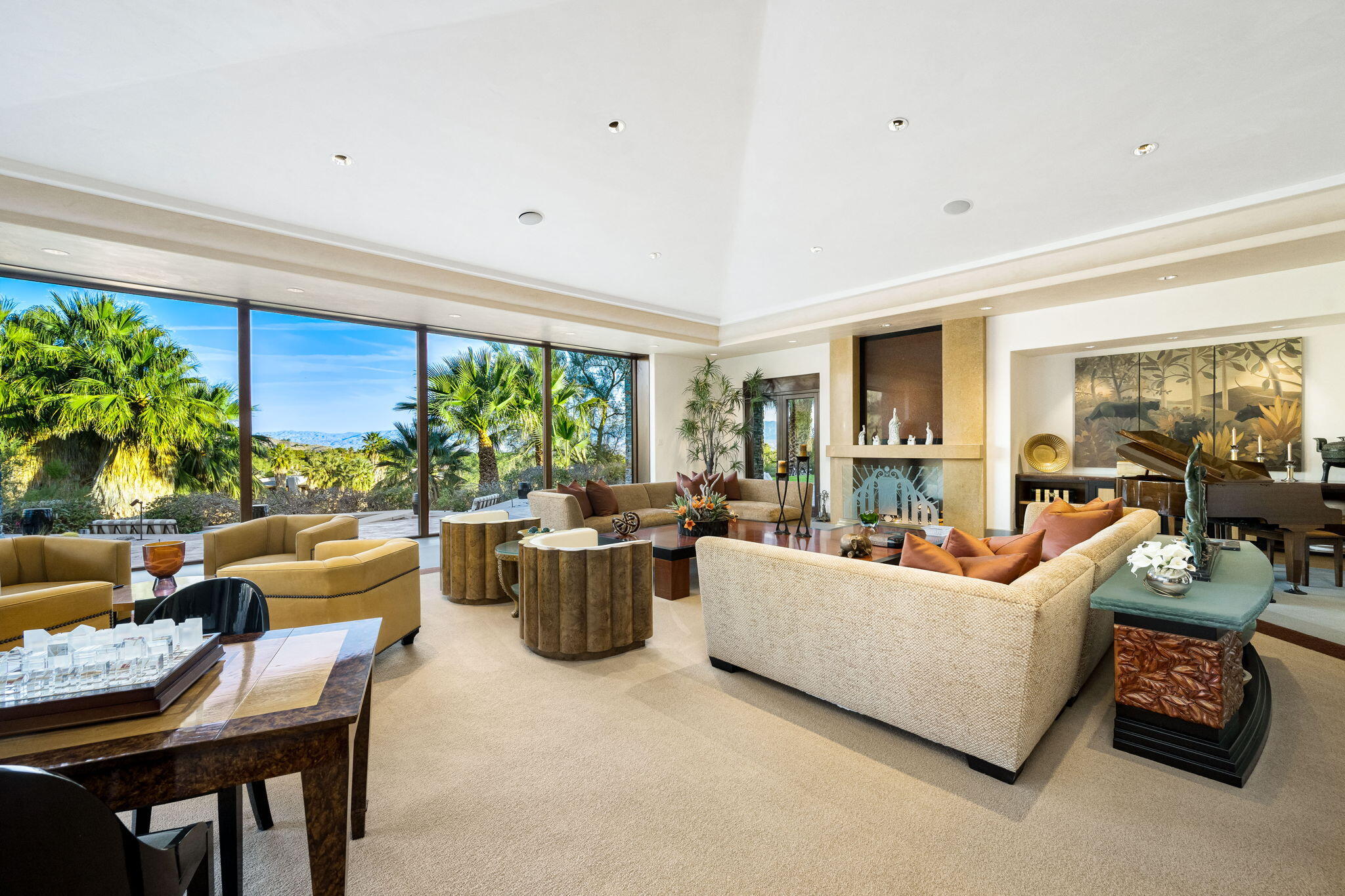 100 Lantana View Palm Desert, CA 92260 - Photo 13 of 121 a living room with furniture and a potted plant