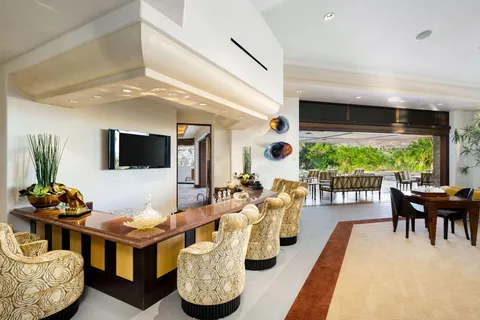 a kitchen with stainless steel appliances a stove microwave and refrigerator