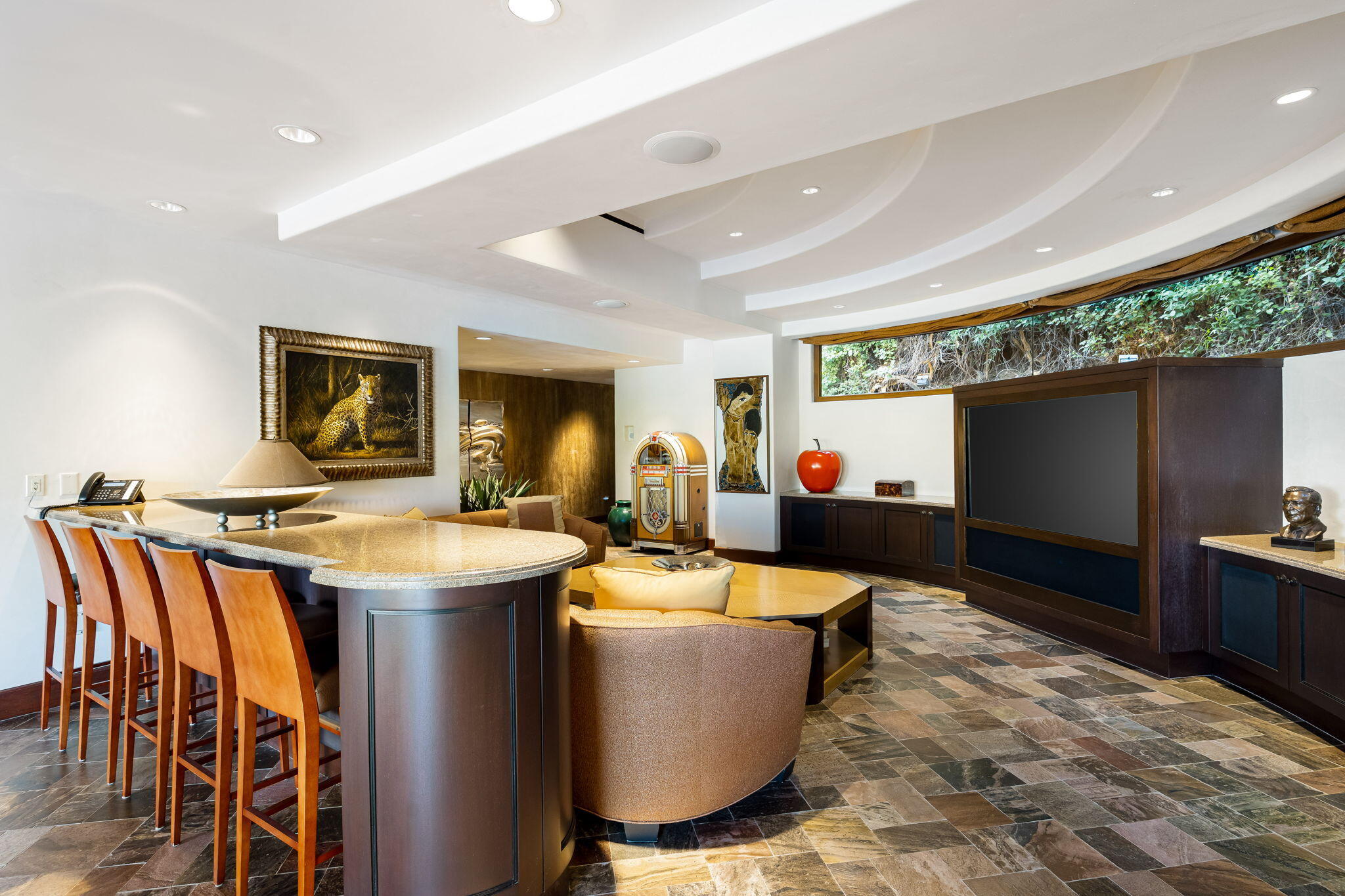 100 Lantana View Palm Desert, CA 92260 - Photo 21 of 121 a living room with dining room and large windows