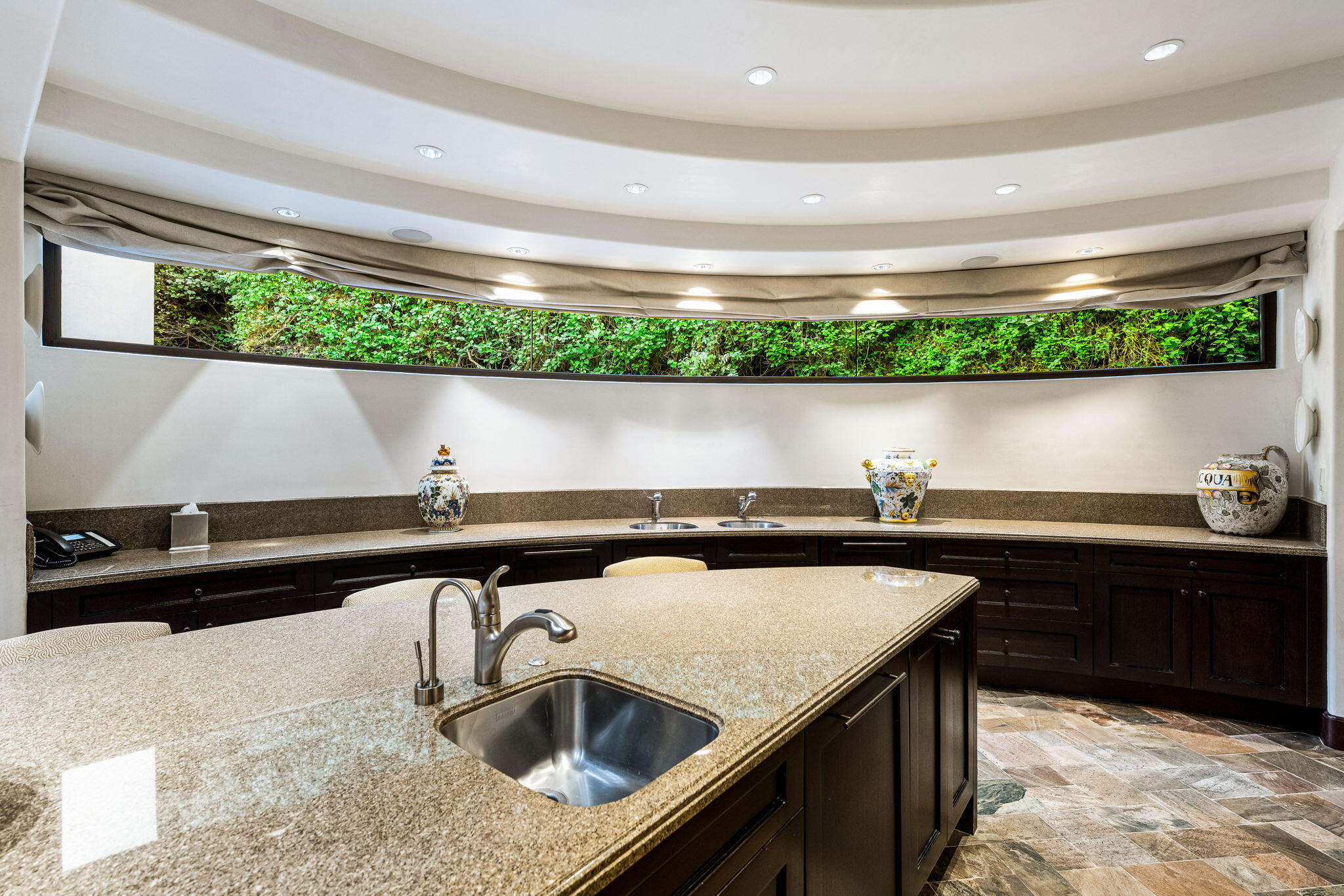 100 Lantana View Palm Desert, CA 92260 - Photo 25 of 121 a kitchen with a sink and a large window