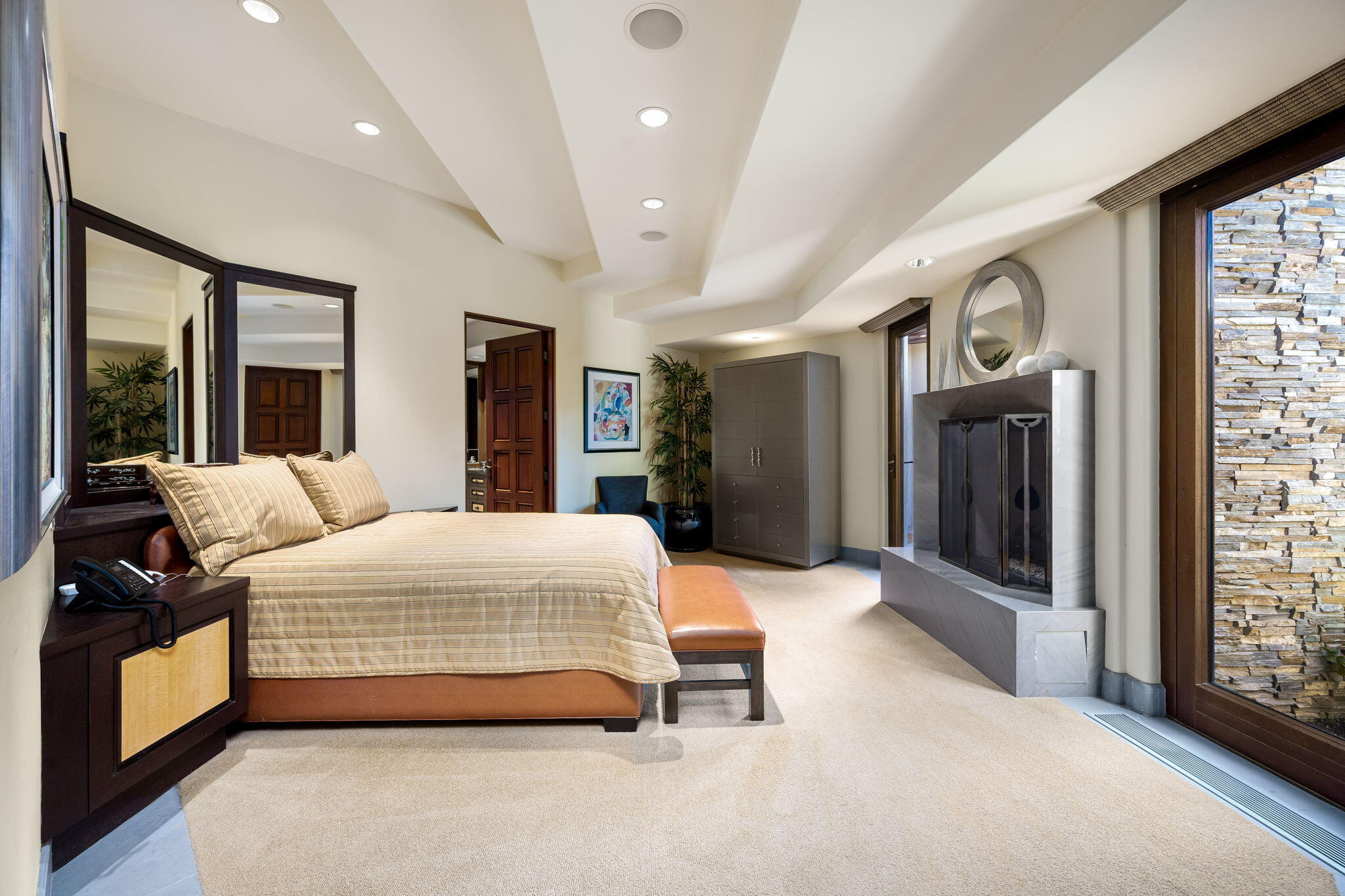 100 Lantana View Palm Desert, CA 92260 - Photo 41 of 121 a bedroom with a large bed and a large mirror