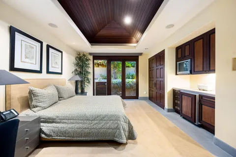 a view of a swimming pool with an outdoor space and seating area