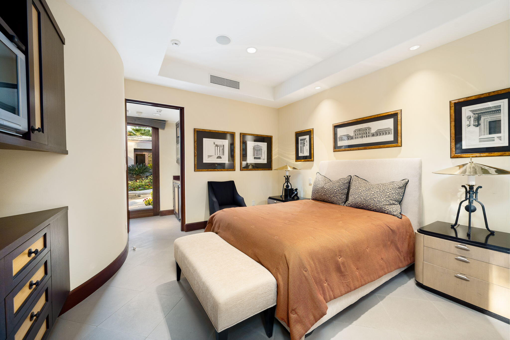 100 Lantana View Palm Desert, CA 92260 - Photo 52 of 121 a bedroom with a large bed and a couch