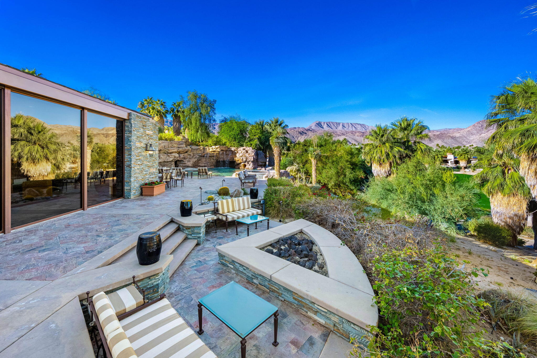 100 Lantana View Palm Desert, CA 92260 - Photo 56 of 121 a view of a backyard with sitting area