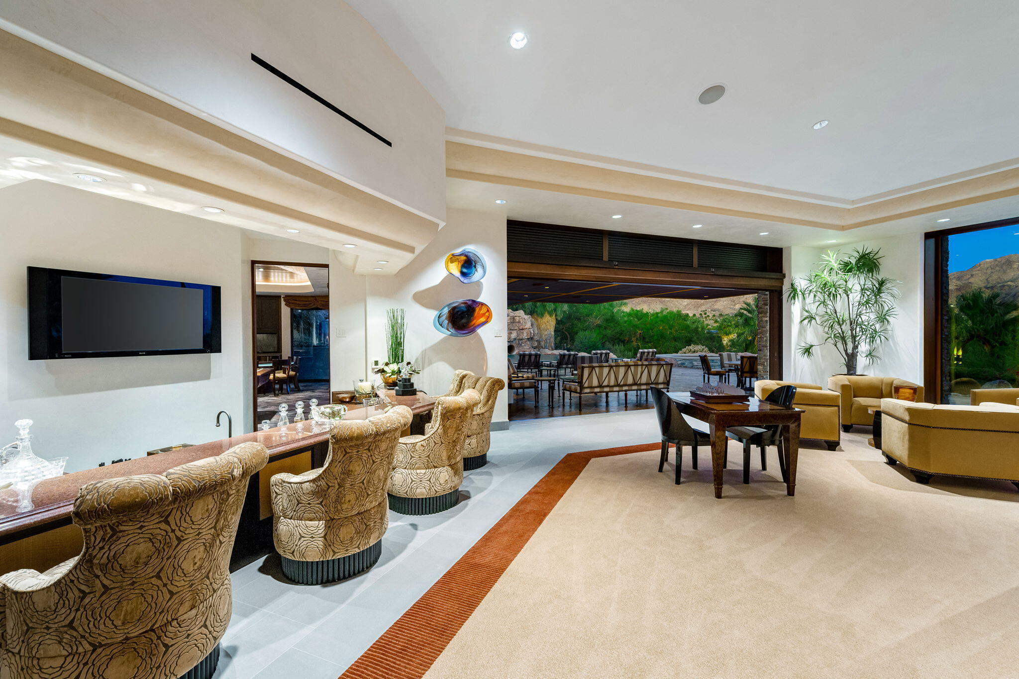 100 Lantana View Palm Desert, CA 92260 - Photo 100 of 121 a living room with furniture and a flat screen tv
