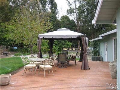 6495 Bennett Valley Road Santa Rosa, CA 95404 - Photo 3 of 11 a view of a table and chairs in patio of the house