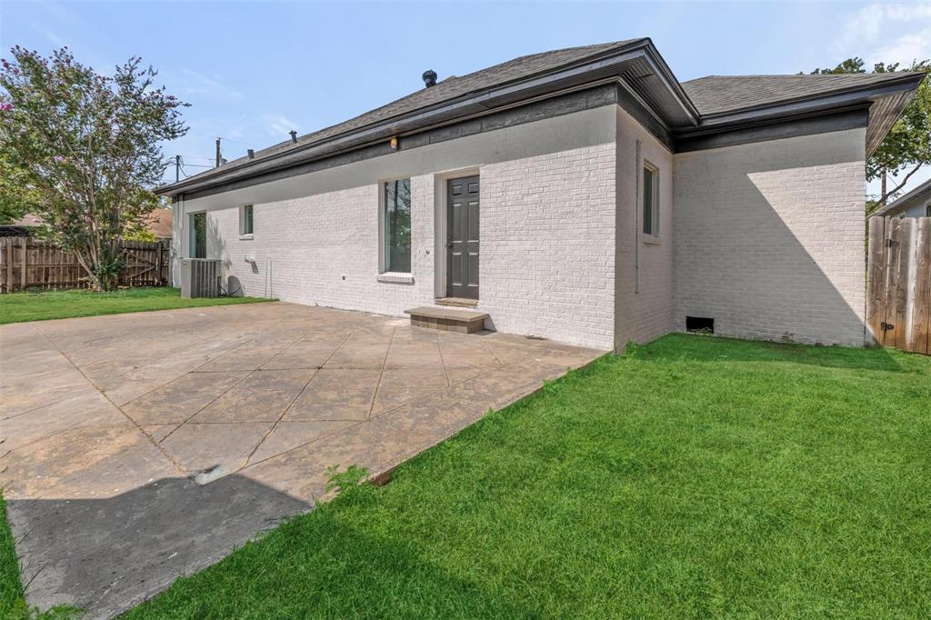 700 North Church Street Decatur, TX 76234 - Photo 2 of 15 a front view of a house with a yard