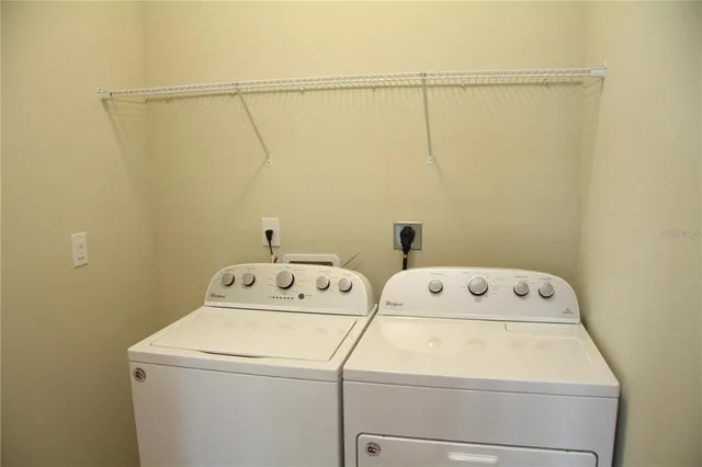 a view of a room with table and chair