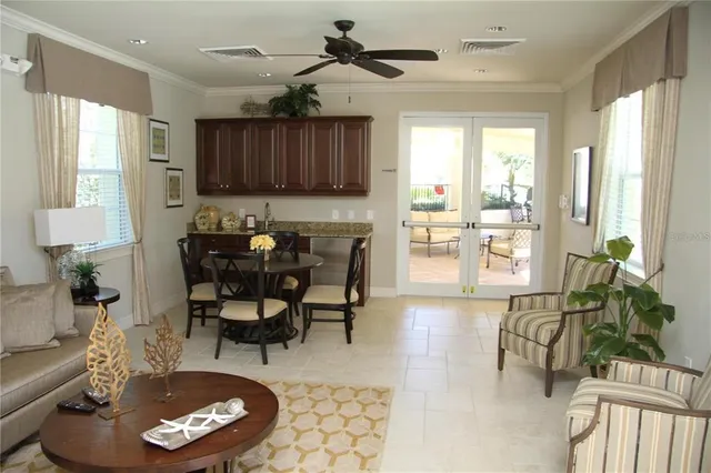 a front view of house with yard and lake view