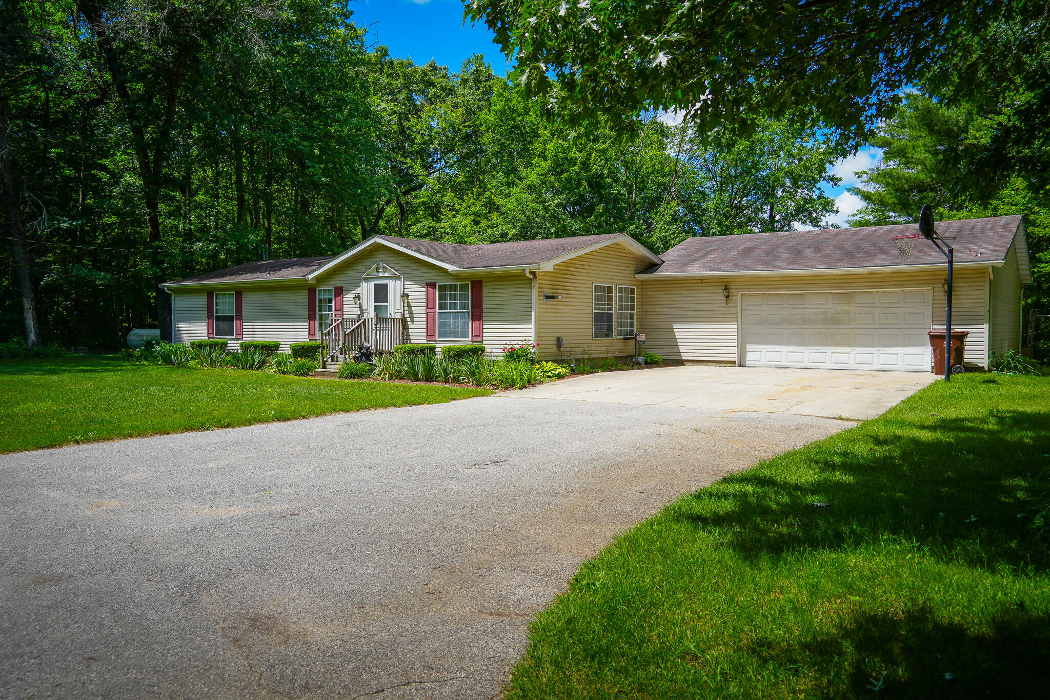 9339 Maple Hill Road Howard City, MI 49329 - Photo 1 of 42 Front of House