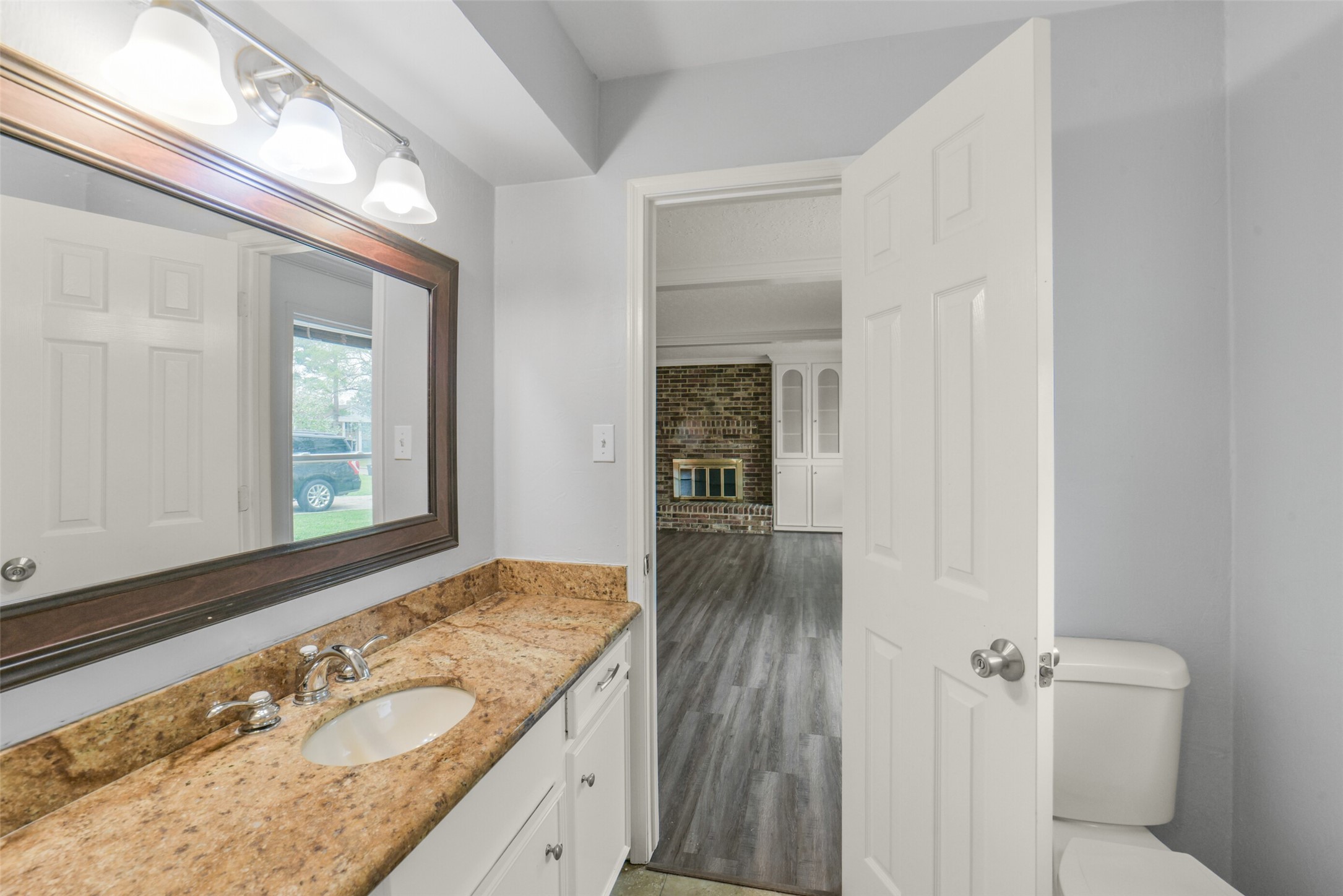 7611 Theisswood Road Spring, TX 77379 - Photo 7 of 41 Half bath offers added convenience for guests and everyday use.