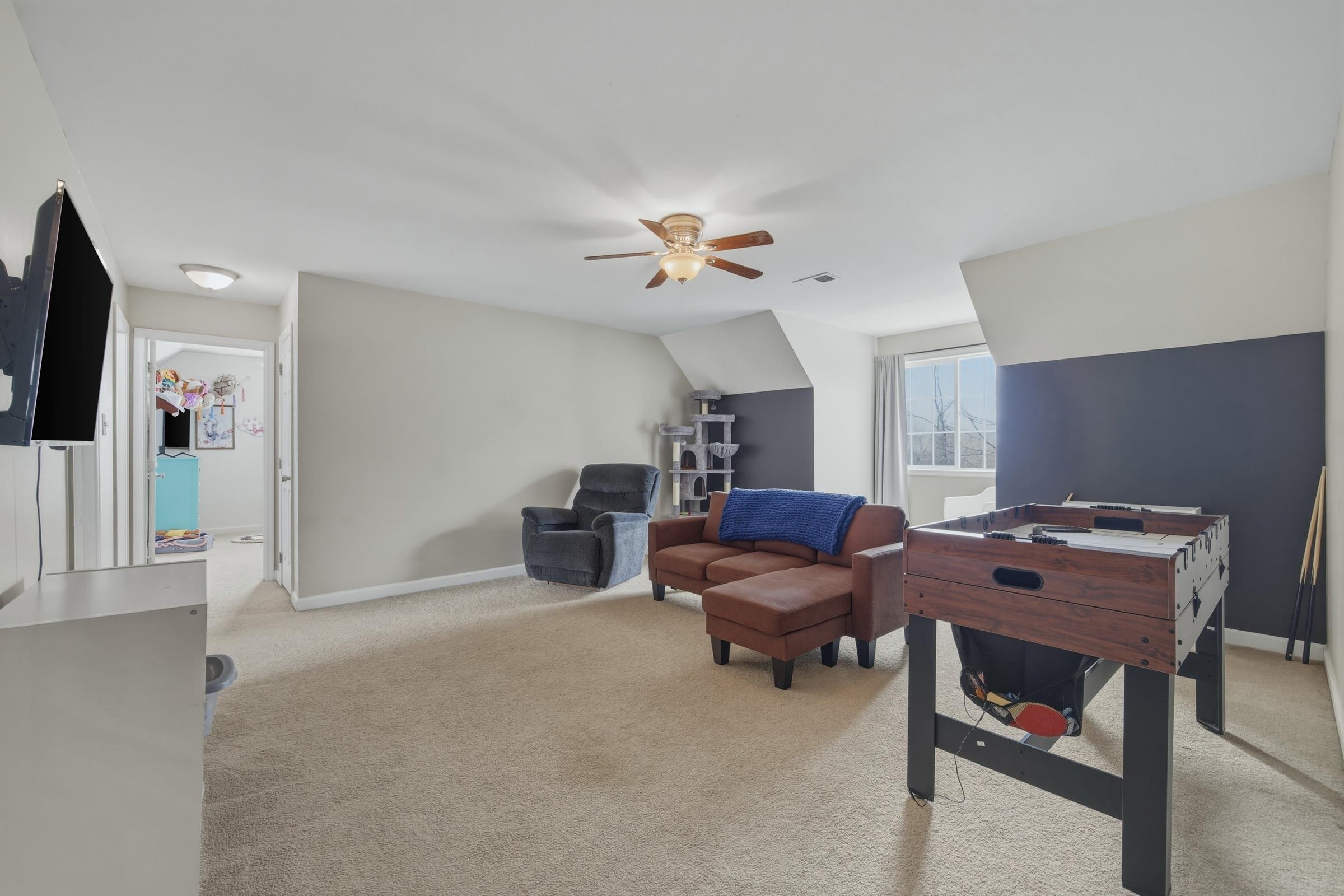257 Hunter Road Maurertown, VA 22644 - Photo 26 of 61 a livingroom with workspace window and a couch