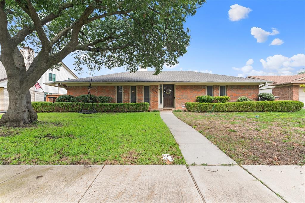 a front view of house with yard