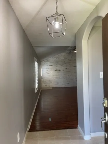 a view of a livingroom from a hallway