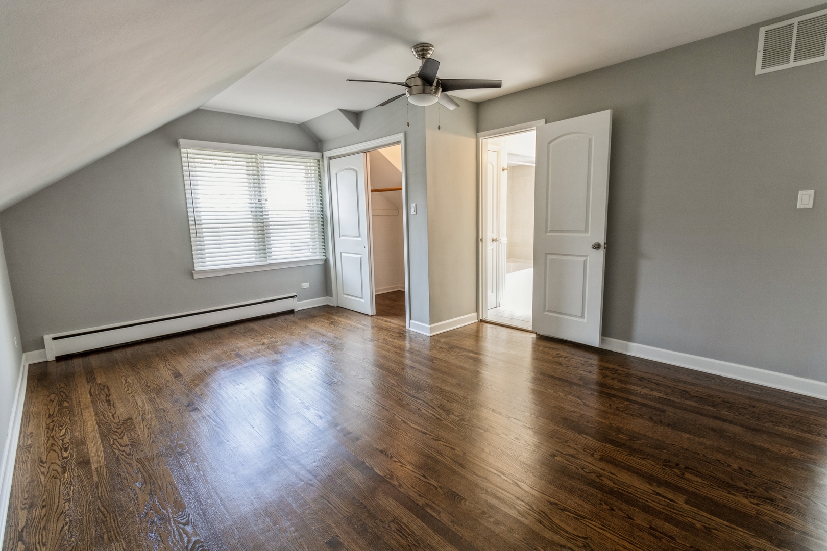 1621 West Talcott Road Park Ridge, IL 60068 - Photo 14 of 26 an empty room with wooden floor and windows
