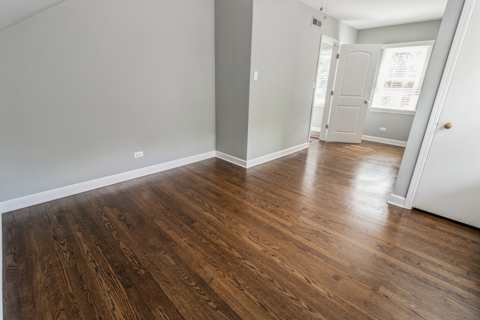 1621 West Talcott Road Park Ridge, IL 60068 - Photo 16 of 26 a view of a hallway with wooden floor