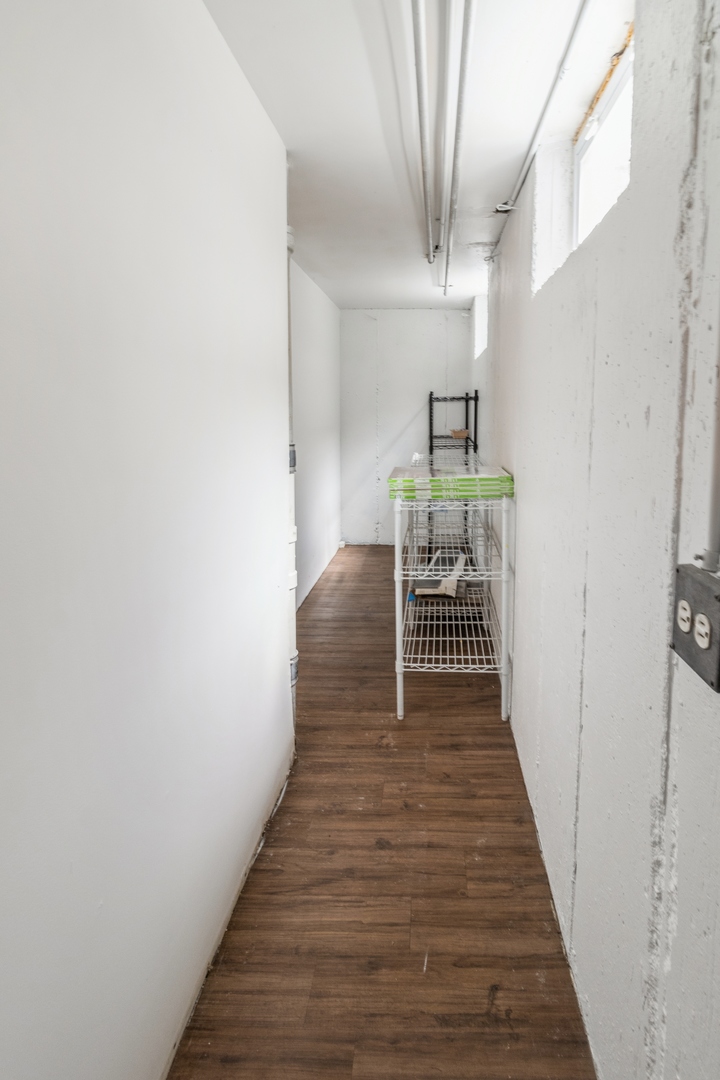 1621 West Talcott Road Park Ridge, IL 60068 - Photo 21 of 26 a view of a hallway with wooden floor