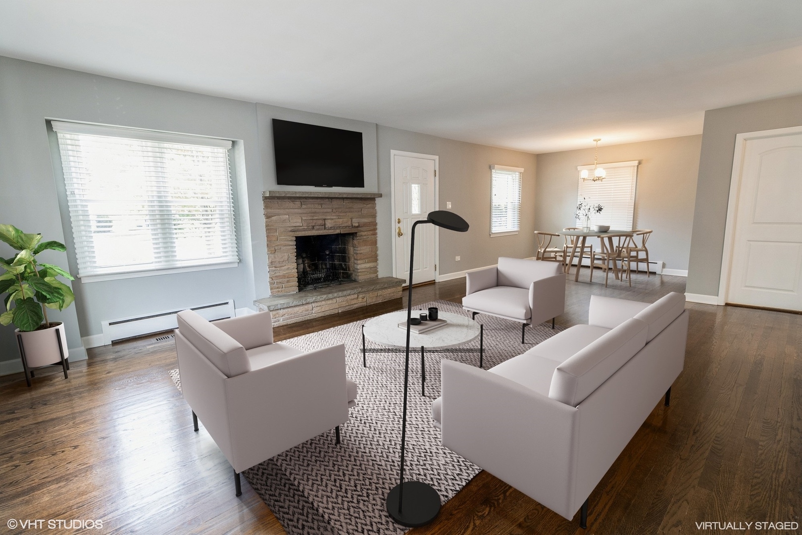 1621 West Talcott Road Park Ridge, IL 60068 - Photo 5 of 26 a living room with furniture a fireplace and a potted plant