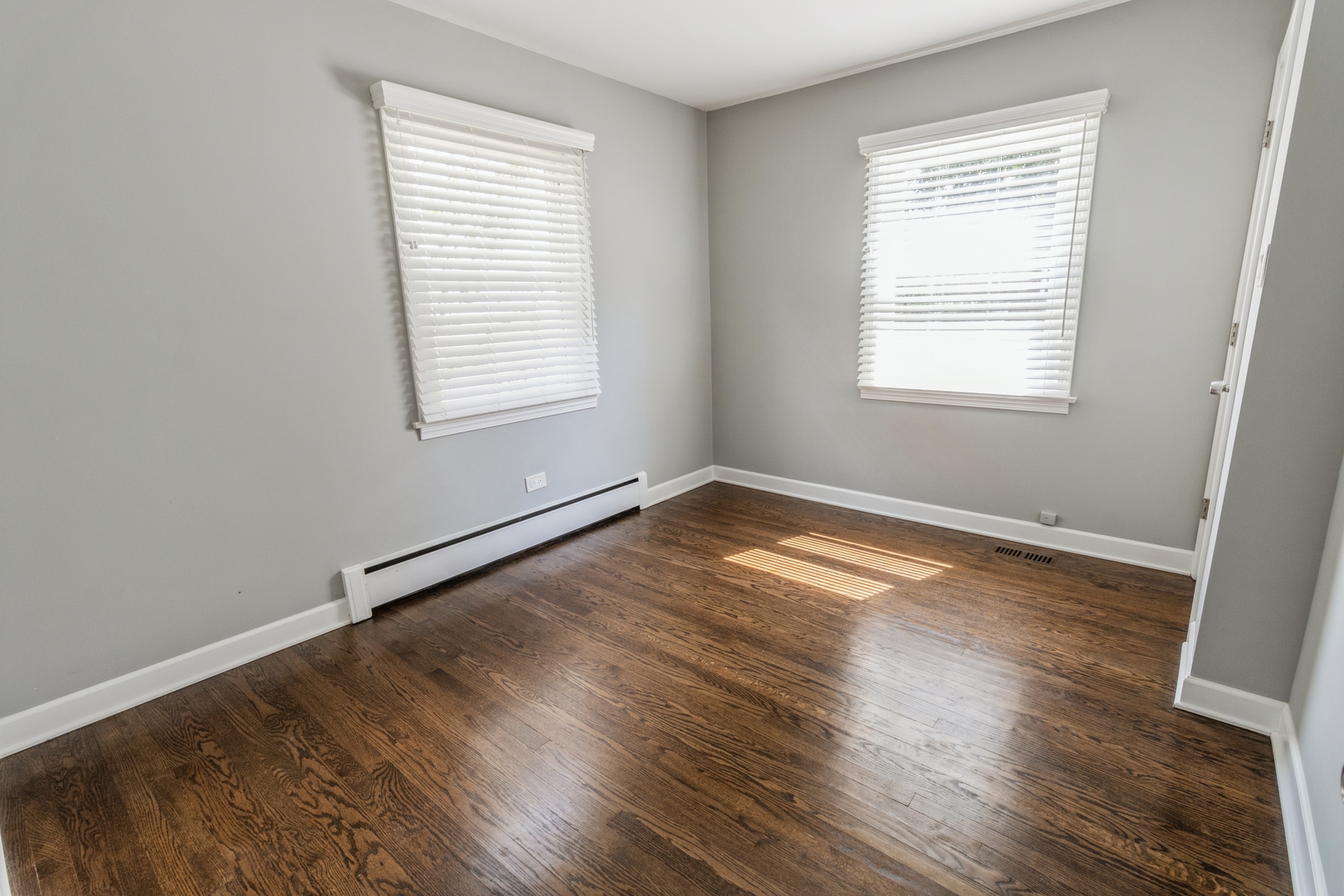 1621 West Talcott Road Park Ridge, IL 60068 - Photo 9 of 26 a view of a room with wooden floor and a window