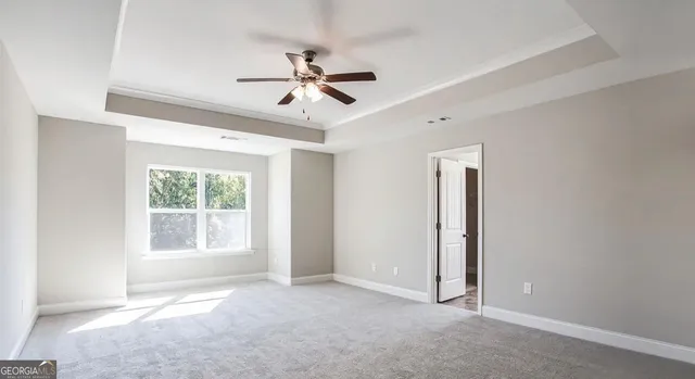 a bathroom with a double vanity sink a mirror and a bathtub
