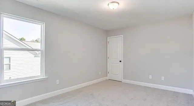 a bathroom with a tub and a sink