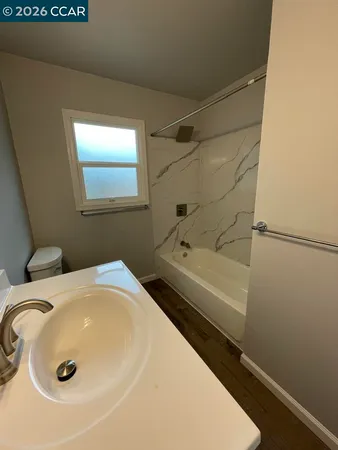 a bathroom with a sink and a tub