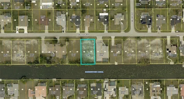 a view of a glass door with a yard