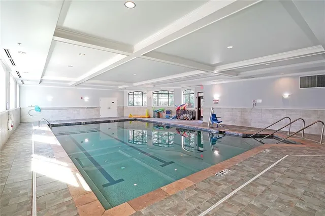 a kitchen with lots of table and chairs